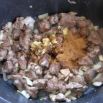 Add onion, garlic and spices