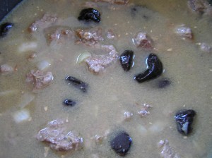 Add broth and prunes